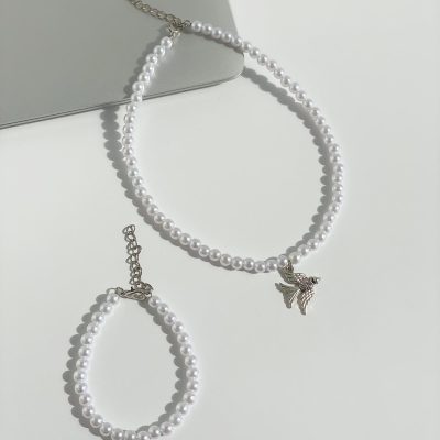 Комплект з намистом з пташкою і браслетом